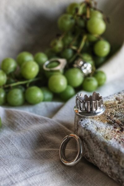 A bold silver ring inspired by an ancient Greek column fragment, handcrafted in Barcelona. Part of a collection of chunky, statement dark fashion rings influenced by history, mythology, and legends.