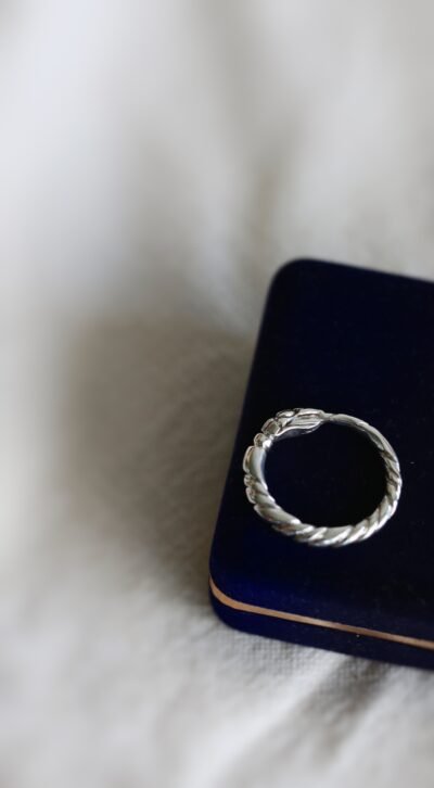 A handmade silver Ouroboros snake ring symbolizing eternity, featuring a mythological snake design. Perfect as a stacking ring or a unique ancient symbol jewelry gift