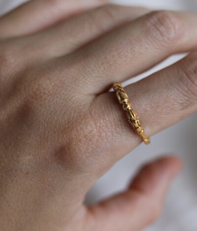 A handmade silver Ouroboros snake ring symbolizing eternity, featuring a mythological snake design. Perfect as a stacking ring or a unique ancient symbol jewelry gift