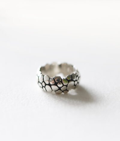 Chunky silver statement ring with crocodile and snake skin texture, featuring bold reptile-scale details for a modern look