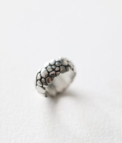 Chunky silver statement ring with crocodile and snake skin texture, featuring bold reptile-scale details for a modern look